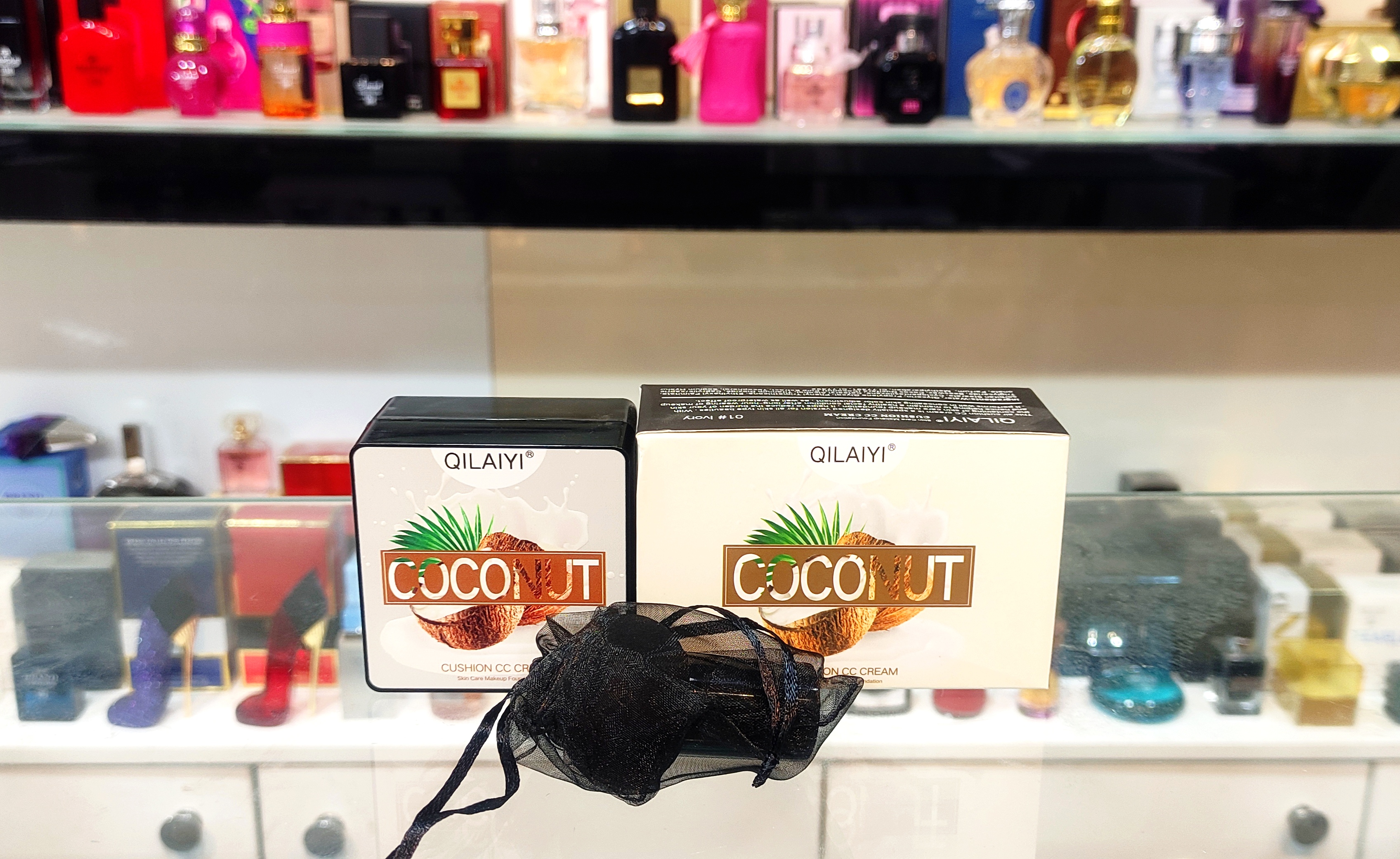 کوشن گیاهی نارگیل QILAIYI سی سی کرم CC cream همراه با پد قارچی و محافظ پد